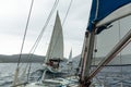 Sailboats participate in sailing regatta 12th Ellada Autumn 2014 among Greek island group in the Aegean Sea Royalty Free Stock Photo