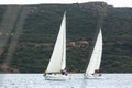 Sailboats participate in sailing regatta 12th Ellada Autumn 2014 among Greek island group in the Aegean Sea Royalty Free Stock Photo