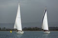 Sailboats participate in sailing regatta 12th Ellada Autumn 2014 among Greek island group Royalty Free Stock Photo