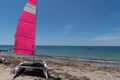 Sailboats pink from rent at Noirmoutier beach in vendÃÂ©e France Royalty Free Stock Photo