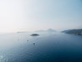 Sailboats sail along the Kotor Bay to the island of Mamula. Montenegro