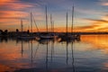 Sailboats sitting at mooring in the morning light of the San Diego bay.