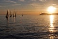 Sailboats in sunset