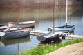 Sailboats are tethered at the pier on the Kutum River