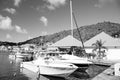 Sailboats and yachts anchored at sea pier on tropical beach. Yachting and sailing. Luxury travel on yacht. Summer Royalty Free Stock Photo