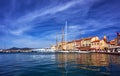 Sailboats and yachts moored to the quay port of Saint-Tropez