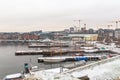 Sailboats and yachts moored in a winter anchorage in Oslo Fjord Bay Royalty Free Stock Photo