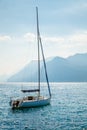 Sailer at water of lake bay