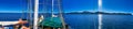 Sailing along beautiful islands scenario. Panoramic seascape sunset view from the sailing ship Royalty Free Stock Photo