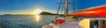 Sailing along beautiful islands scenario. Panoramic seascape sunset view from the sailing ship Royalty Free Stock Photo