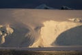 Antarctica calm orange midnight sunset on glacier