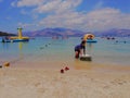 sailing beach sea blue sky clouds cloudy day sunny happy water boat fish blue island cloudy skyline girl Royalty Free Stock Photo