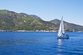 Sailing boat on Aegean sea near Nisyros Island Royalty Free Stock Photo