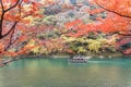Sailing boat in autumn, Arashiyama, Kyoto, Japan