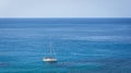 Sailing boat on blue mediterranean water in Ibiza island Royalty Free Stock Photo