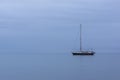 Sailing boat in blue twilight before sunrise Royalty Free Stock Photo