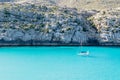 Sailing boat on blue water beach mountain background Royalty Free Stock Photo