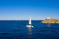 Sailing boat catamaran with white sails, rippled sea background Royalty Free Stock Photo