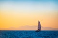 Sailing boat on the evening sea Royalty Free Stock Photo
