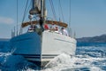 Sailing boat is going straight to the camera. Mediterranean sea cruising. Royalty Free Stock Photo