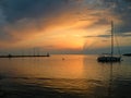 Sailing boat floating on a peaceful surface of theAdriatic Sea,Croatia,Europe.Sunset and the calm sea with beautiful purple sky an