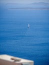 A sailing boat leaving the harbour of Astypalaia