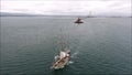 Sailing boat leaving port. Poolbeg. Dublin. Ireland