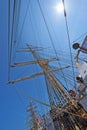 Sailing, boat and mast outdoor with flag for travel, journey and low angle of blue sky in summer. Ship, wood pole and Royalty Free Stock Photo