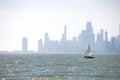 Sailing boat on Montrose beach with Chicago city in the background Royalty Free Stock Photo