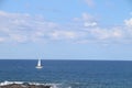 sailing boat near an island