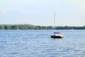 Boat anchored on lake