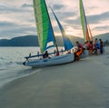 Sailing boat at Sanya beach and Sunset Royalty Free Stock Photo