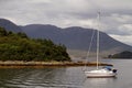 Sailing boat on scottish lake Royalty Free Stock Photo