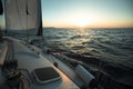 Sailing boat in the sea during amazing sunset. Luxury yacht and cruise holiday. Royalty Free Stock Photo