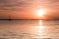 Sailing boat silhouette over sunset Royalty Free Stock Photo