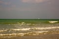 Sailing boat, small point on the vastness. Dieppe, Seine-Maritime, France.