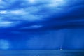 Sailing boat at stormy sea horizon Royalty Free Stock Photo