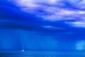 Sailing boat at stormy sea horizon Royalty Free Stock Photo