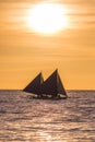 Sailing boat at sunset