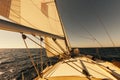 Sailing boat wide angle view in the sea at sunset Royalty Free Stock Photo