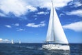 Sailing boat yacht or sail regatta race on blue water Sea. Sport. Royalty Free Stock Photo
