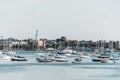 Sailing boats anchored on the Charles River in front of old part of Boston town in Massachusetts USA Royalty Free Stock Photo