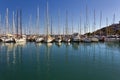 Sailing boats anchored in marina in a sunny day Royalty Free Stock Photo