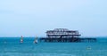 Sailing boats around the derelict West pier in Brighton Royalty Free Stock Photo