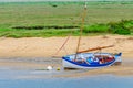 Sailing boats beached at Brancaster Staithe