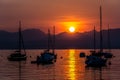 Sailing Boats on lake Garda with sunset, Italy