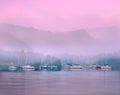 Sailing boats on lake Ullswater at dawn Royalty Free Stock Photo