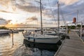 Sailing boats in a marina during a beautiful colourful sunset at the Baltic Sea Royalty Free Stock Photo