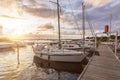 Sailing boats in a marina during a beautiful colourful sunset at the Baltic Sea in Northern Germany Royalty Free Stock Photo