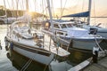 Sailing boats in a marina during a beautiful golden sunset at the Baltic Sea Royalty Free Stock Photo